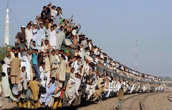 Image result for pictures of vehicles overloaded with people